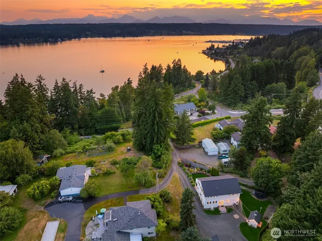 an aerial view of residential houses and outdoor space