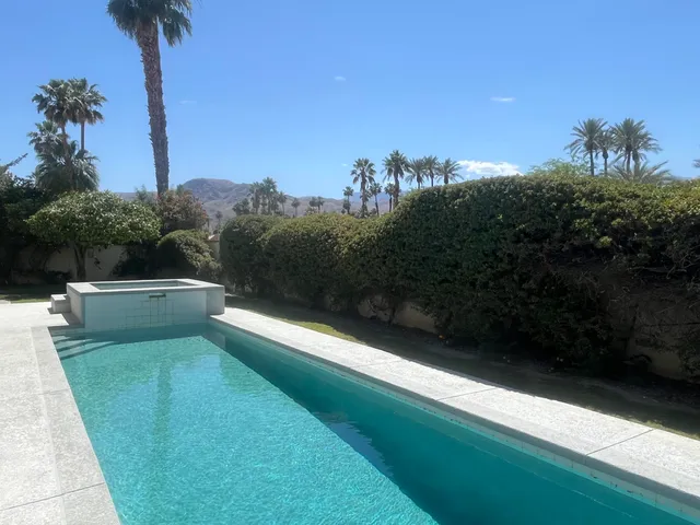 a view of a balcony with an outdoor space