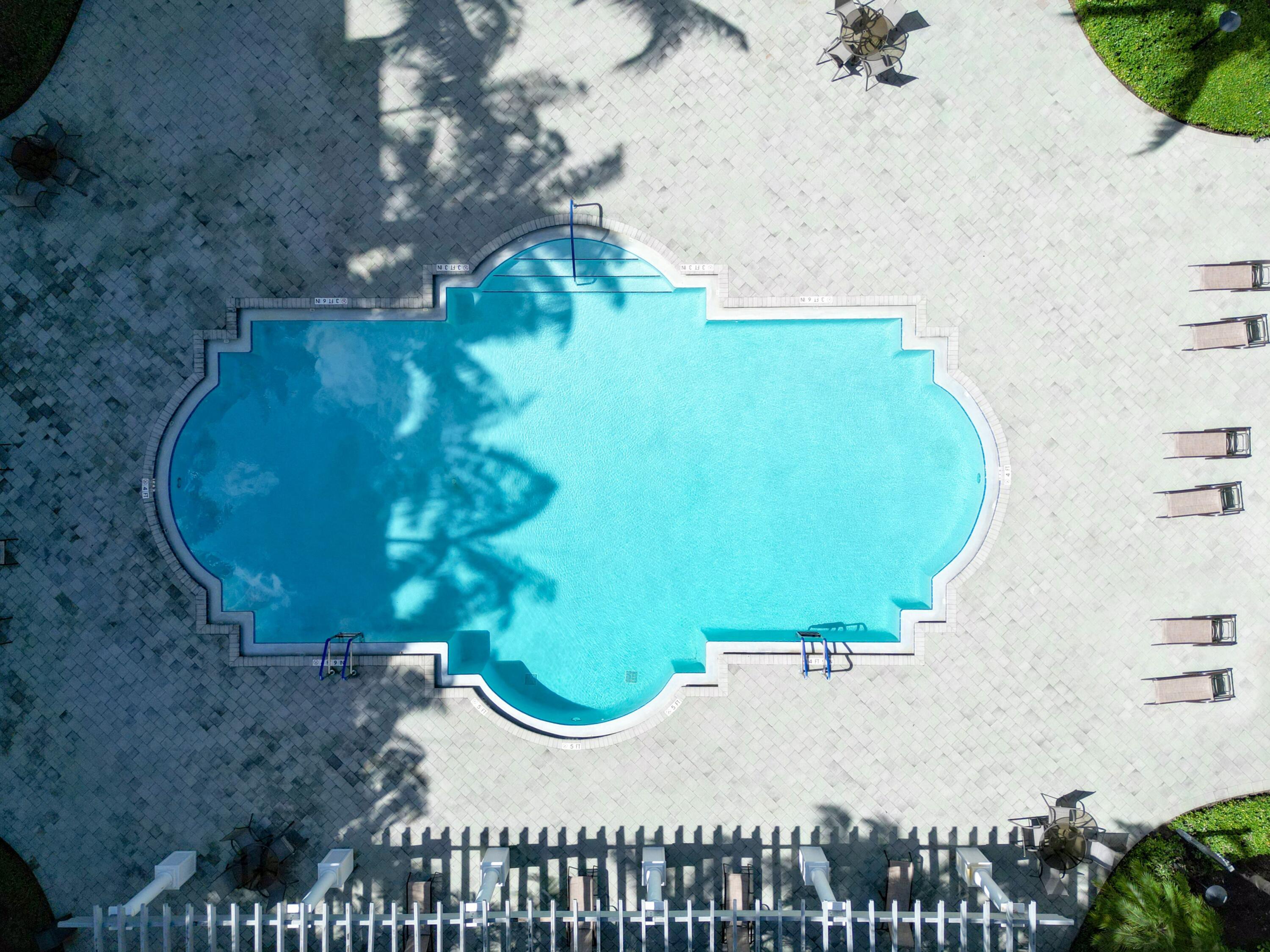 1690 Renaissance Commons Boulevard, Unit 1412 Boynton Beach, FL 33426 - Photo 31 of 49 a view of a swimming pool