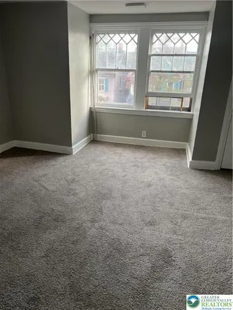 en empty room with windows