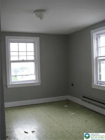 an empty room with a window