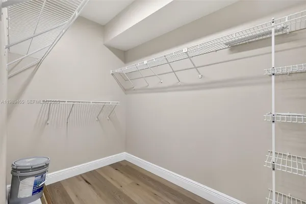 a view of a room with racks on the wall