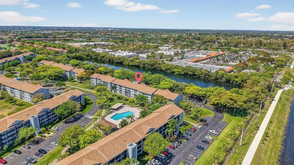 an aerial view of lake and city