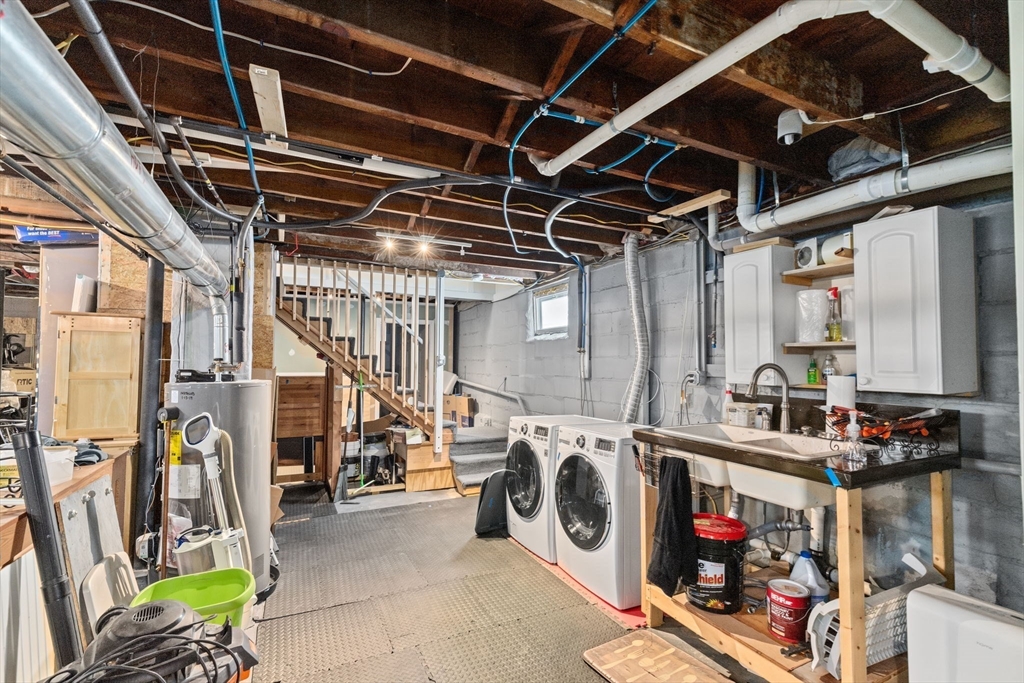 31 Crawford Road Braintree, MA 02184 - Photo 13 of 18 a utility room with dryer washer and other items