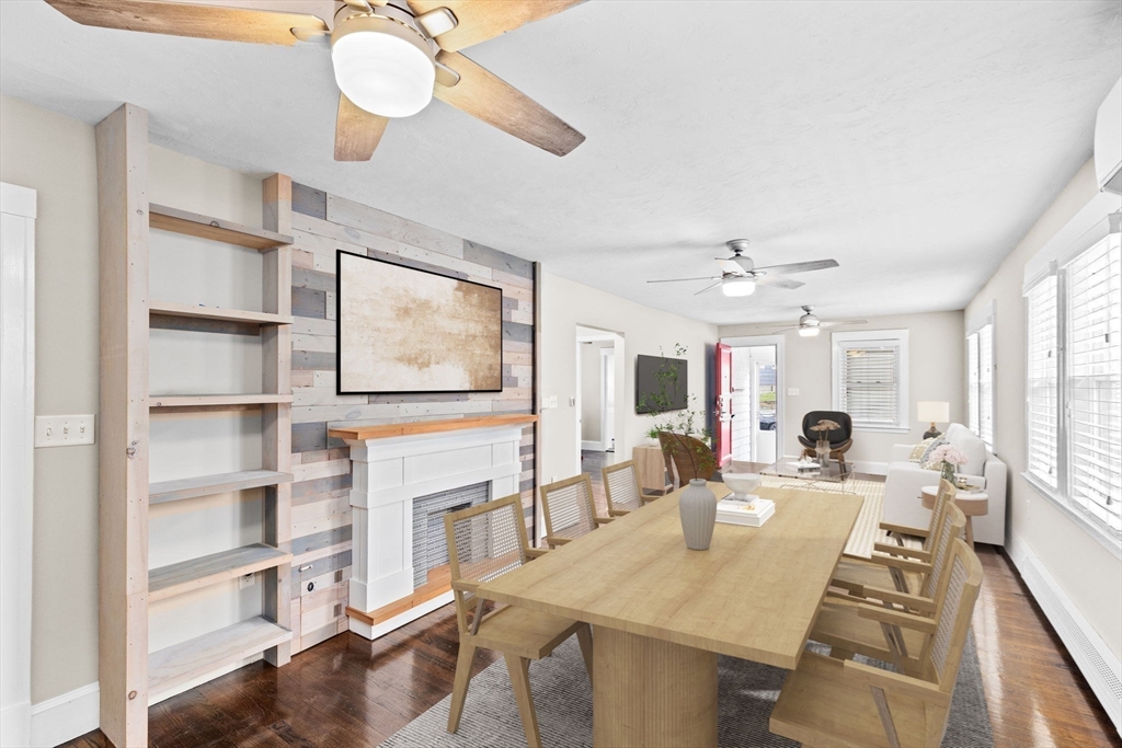 31 Crawford Road Braintree, MA 02184 - Photo 4 of 18 a living room with furniture wooden floor and a large window