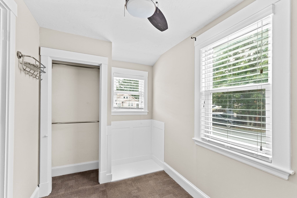 31 Crawford Road Braintree, MA 02184 - Photo 10 of 18 a view of a room with a window and a ceiling fan