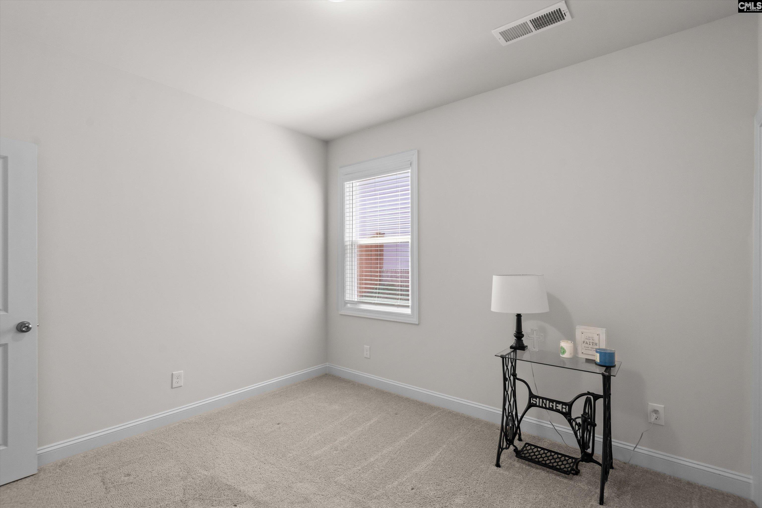 558 Wild Ginger Loop Irmo, SC 29063 - Photo 31 of 42 a room with a window