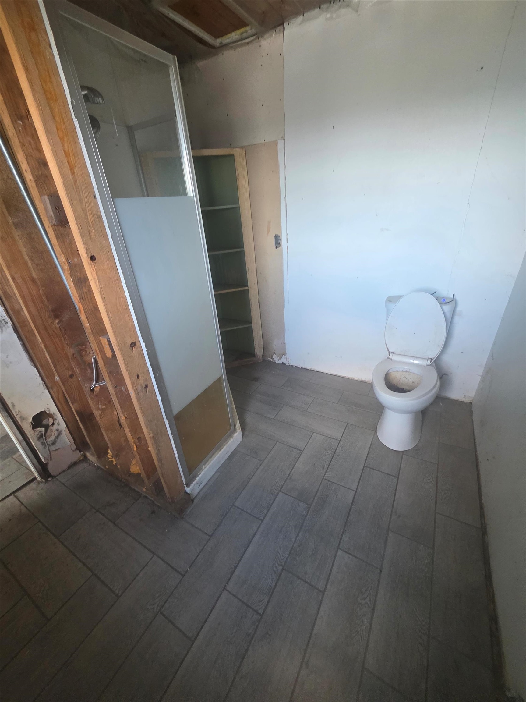 903 Sterling Road Dixon, IL 61021 - Photo 15 of 24 a bathroom with a toilet and a shower