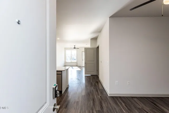 a view of entryway with wooden floor