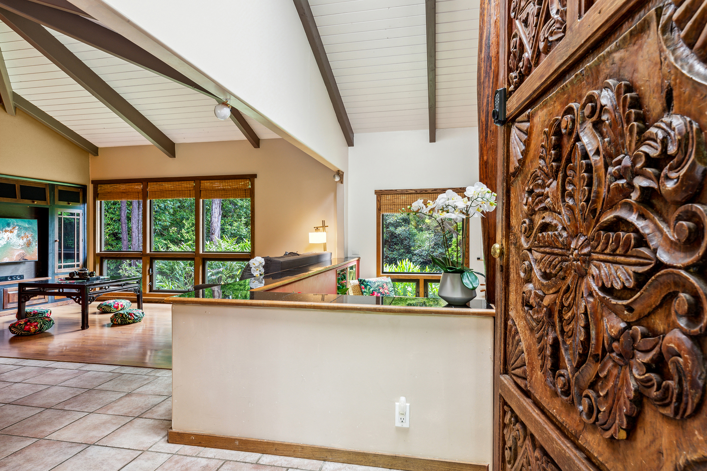 46-4147 Old Mamalahoa Highway, Unit B Honokaa, HI 96727 - Photo 13 of 30 a living room with large windows