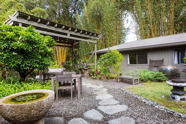 a patio with table and chairs