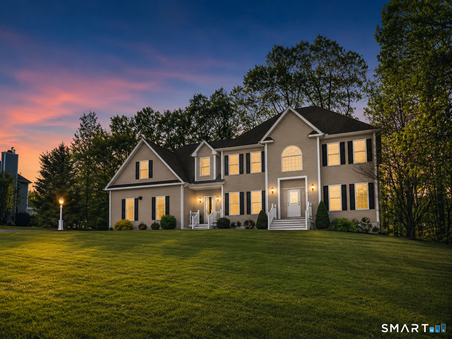 4 Ortense Road Wallingford, CT 06492 - Photo 3 of 33 a front view of a house with a garden