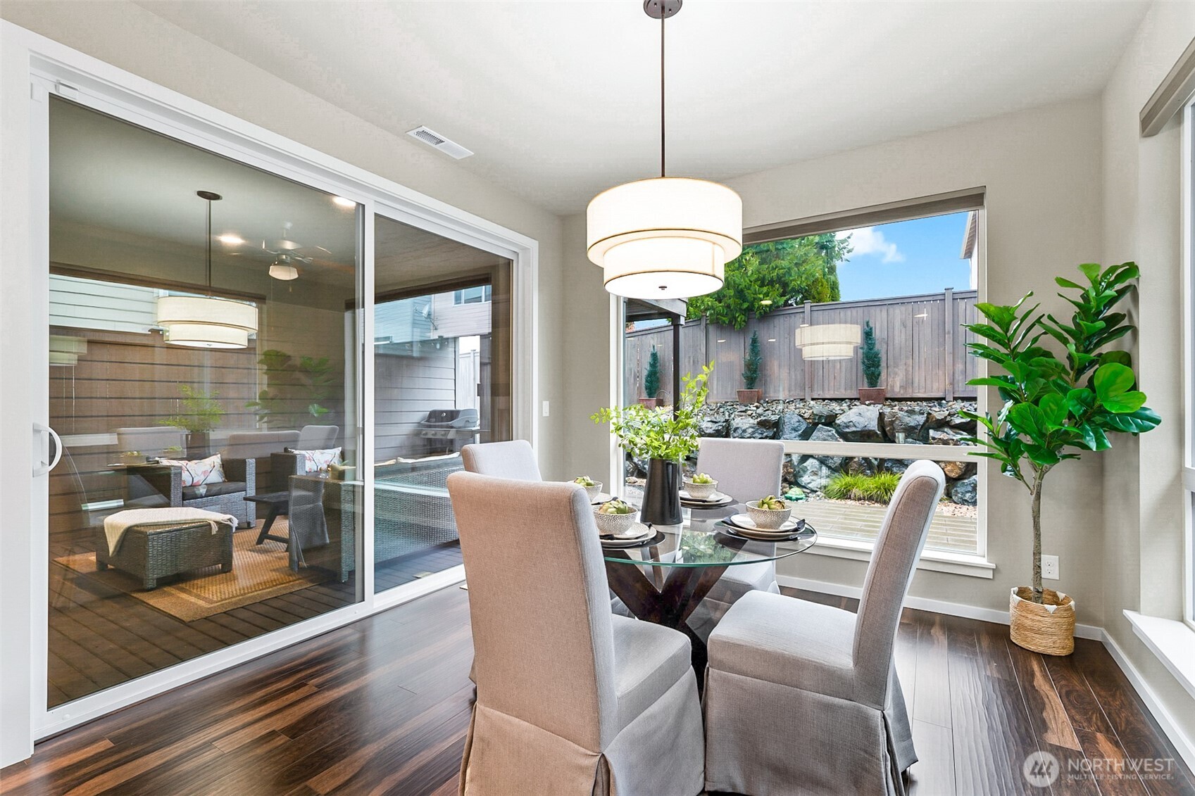 4009 168th Place Southeast Bothell, WA 98012 - Photo 13 of 38 a dining room with furniture a chandelier and window