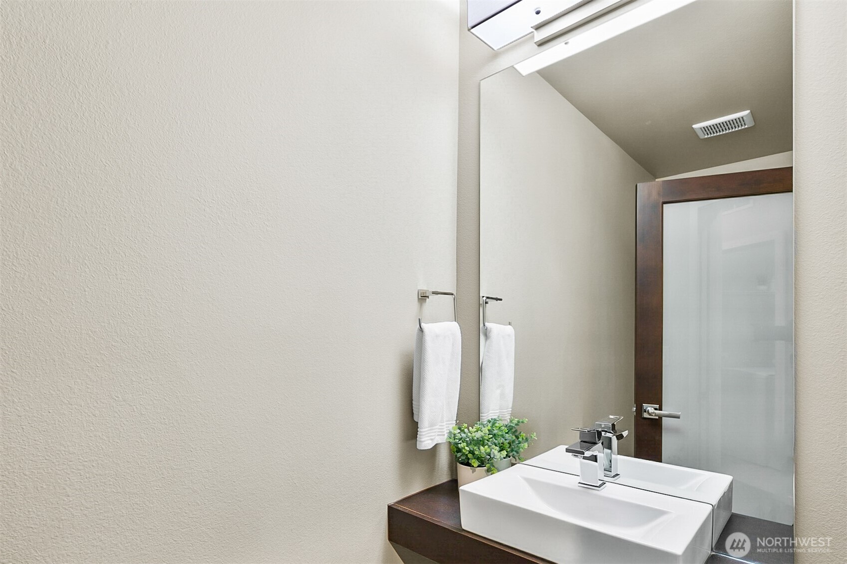 4009 168th Place Southeast Bothell, WA 98012 - Photo 18 of 38 a bathroom with a sink and a mirror