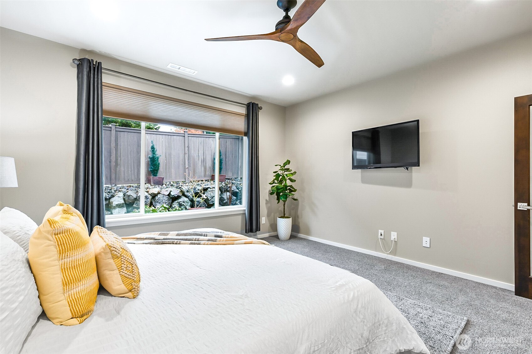 4009 168th Place Southeast Bothell, WA 98012 - Photo 21 of 38 a spacious bedroom with a bed and a window