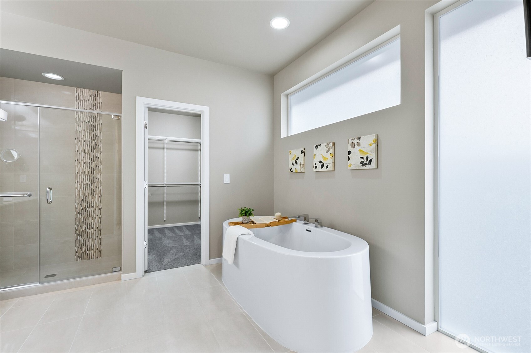 4009 168th Place Southeast Bothell, WA 98012 - Photo 25 of 38 a white bath tub sitting next to a bathroom