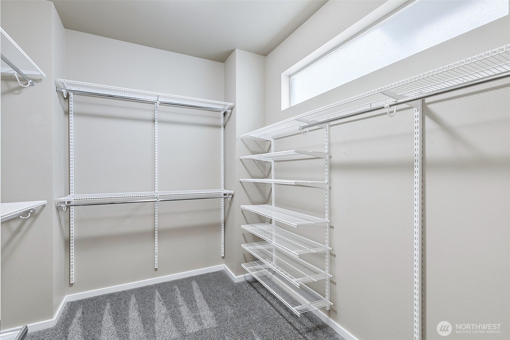4009 168th Place Southeast Bothell, WA 98012 - Photo 26 of 38 a view of walk in closet with empty racks