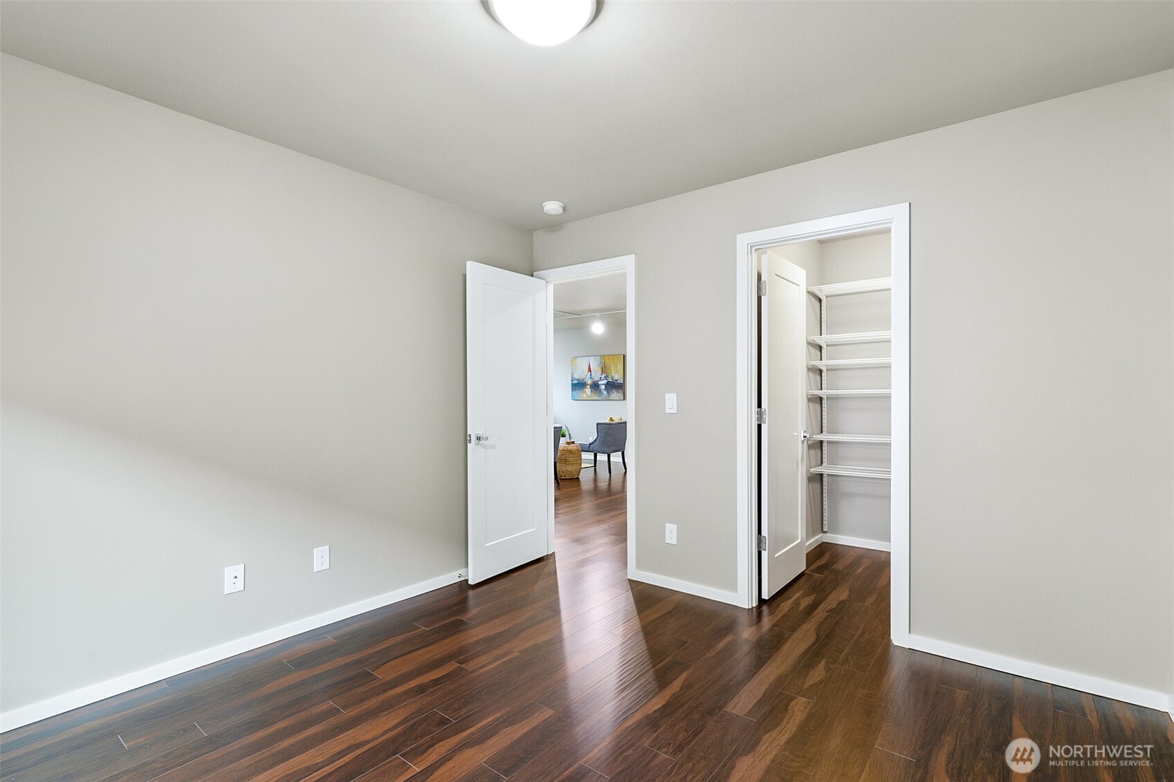 4009 168th Place Southeast Bothell, WA 98012 - Photo 29 of 38 a view of empty room with wooden floor