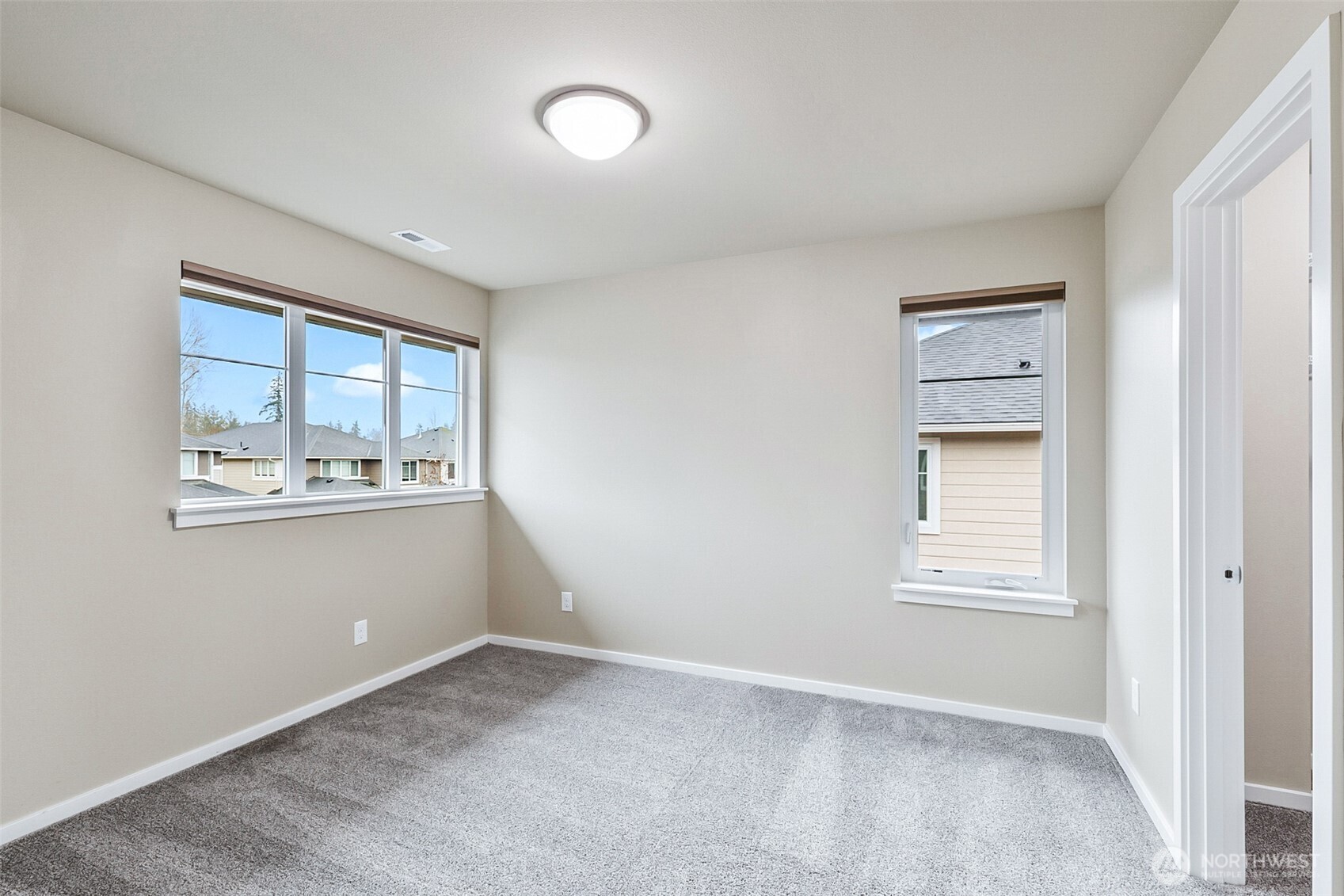 4009 168th Place Southeast Bothell, WA 98012 - Photo 31 of 38 an empty room with windows