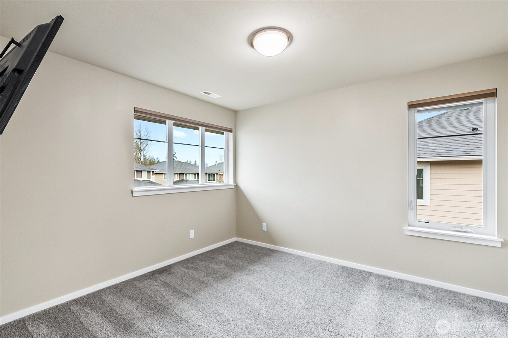 4009 168th Place Southeast Bothell, WA 98012 - Photo 32 of 38 an empty room with windows