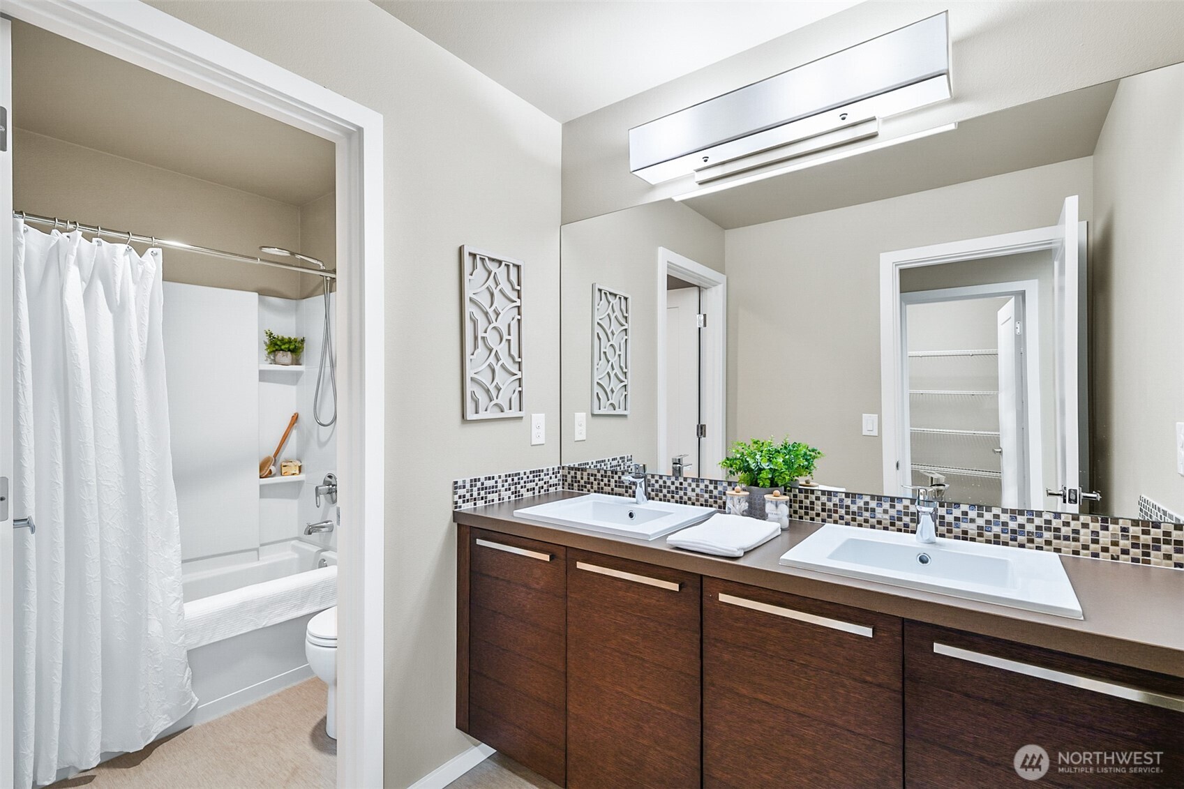 4009 168th Place Southeast Bothell, WA 98012 - Photo 35 of 38 a bathroom with a sink and a mirror