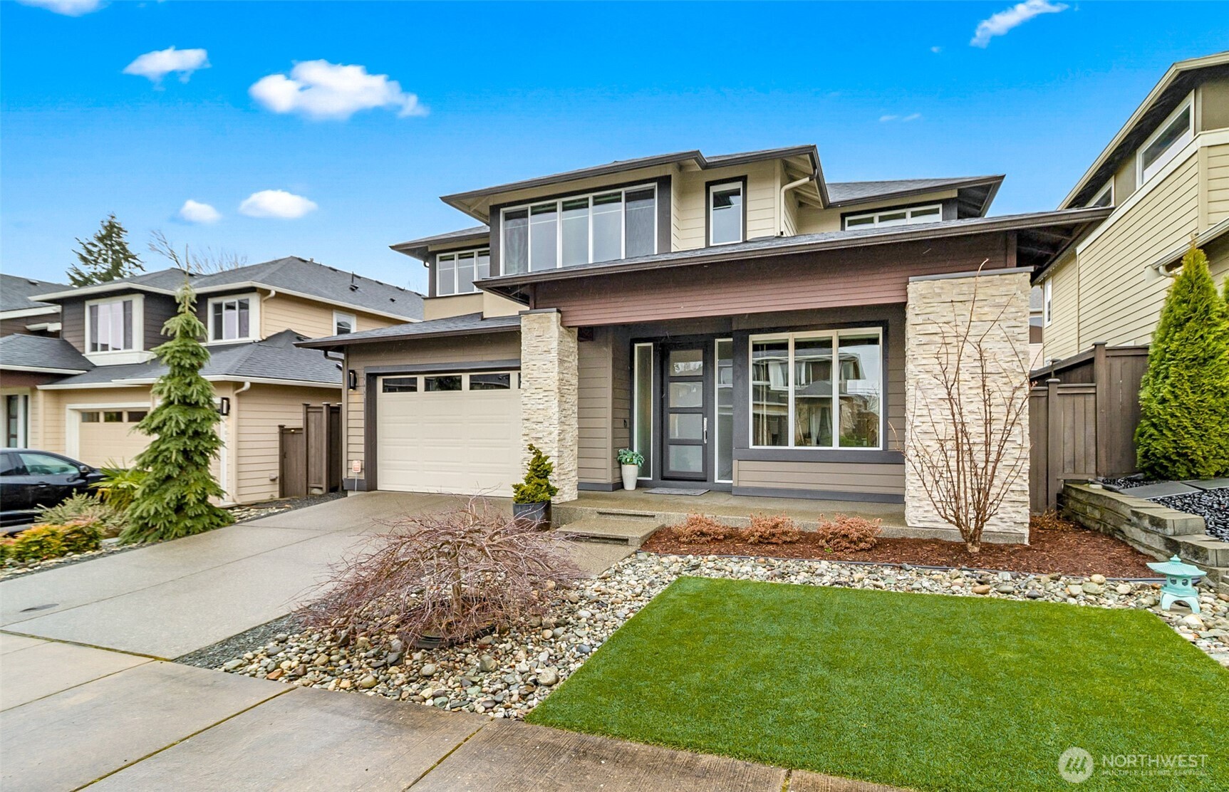4009 168th Place Southeast Bothell, WA 98012 - Photo 38 of 38 a front view of a house with a yard