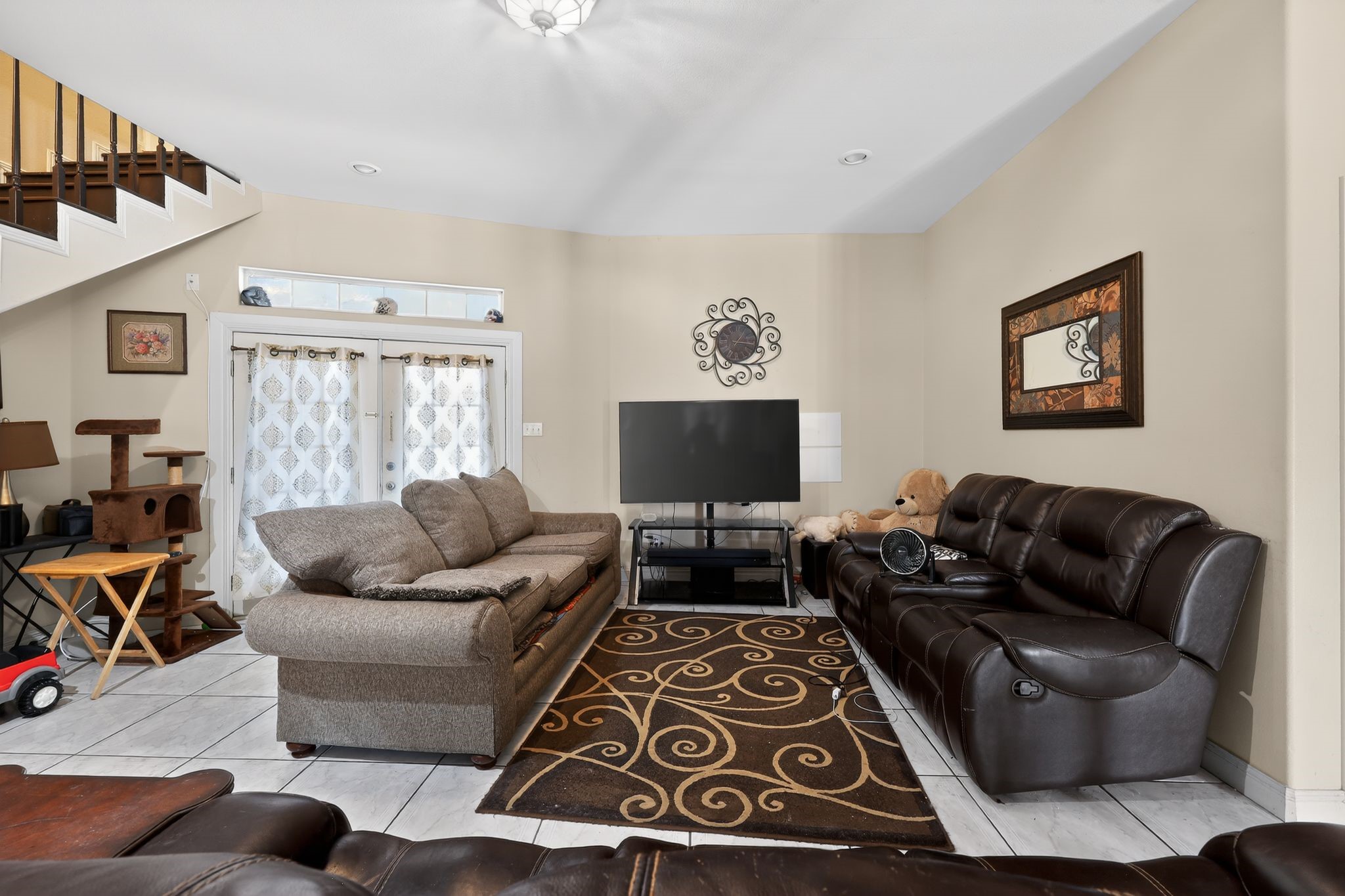 901 Royal Street Edinburg, TX 78539 - Photo 11 of 30 a living room with furniture and a flat screen tv