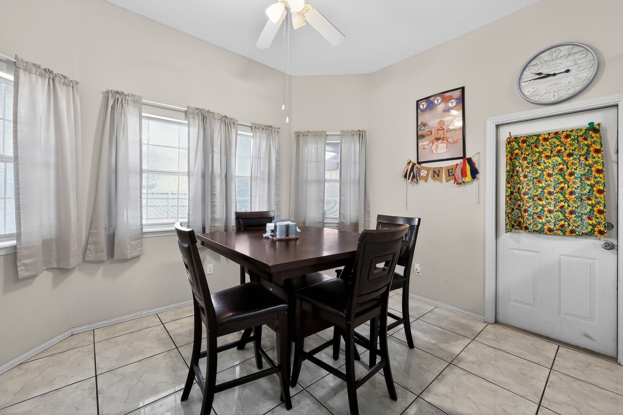901 Royal Street Edinburg, TX 78539 - Photo 17 of 30 a view of a dining room with furniture and window