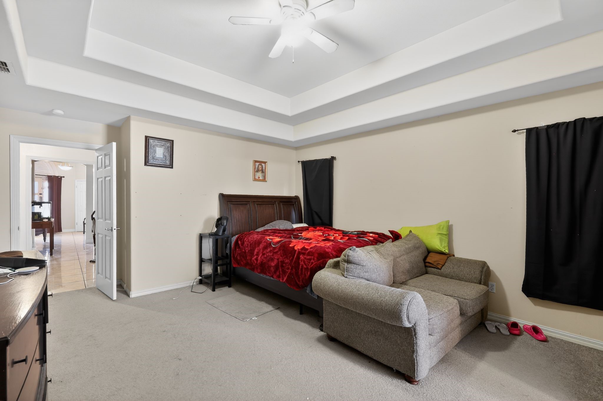 901 Royal Street Edinburg, TX 78539 - Photo 21 of 30 a bedroom with a bed and a flat screen tv