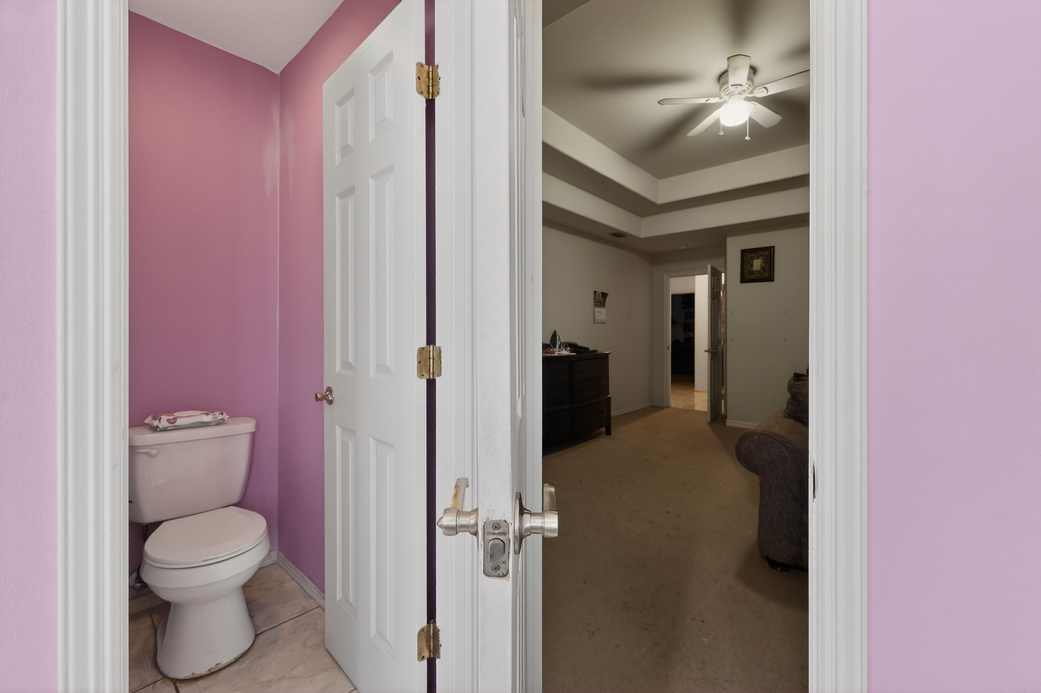 901 Royal Street Edinburg, TX 78539 - Photo 27 of 30 a bathroom with a toilet sink and shower
