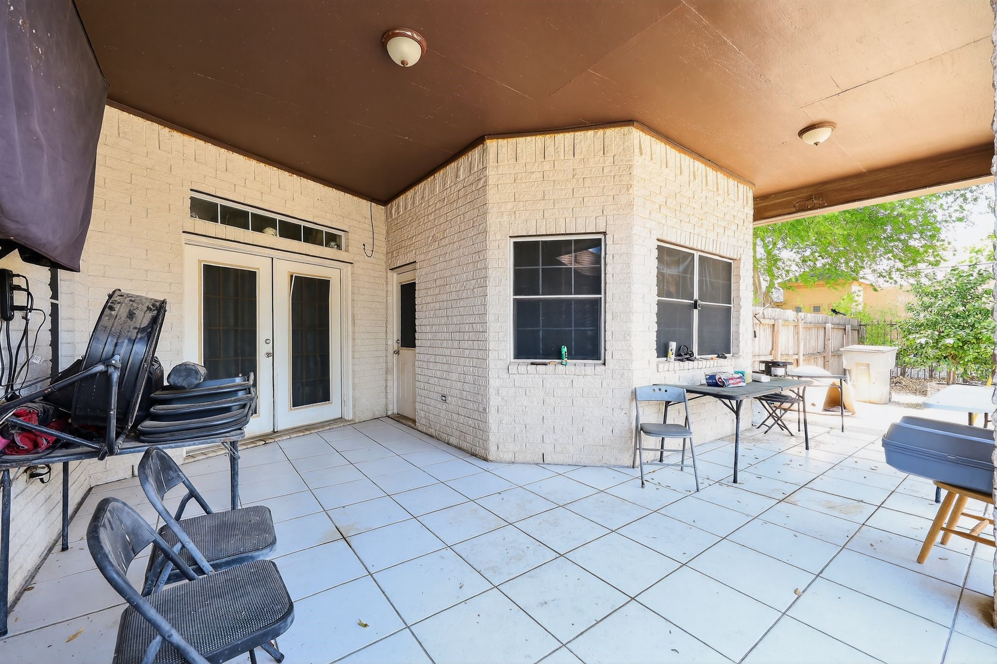 901 Royal Street Edinburg, TX 78539 - Photo 8 of 30 a view of a chairs and table in a patio