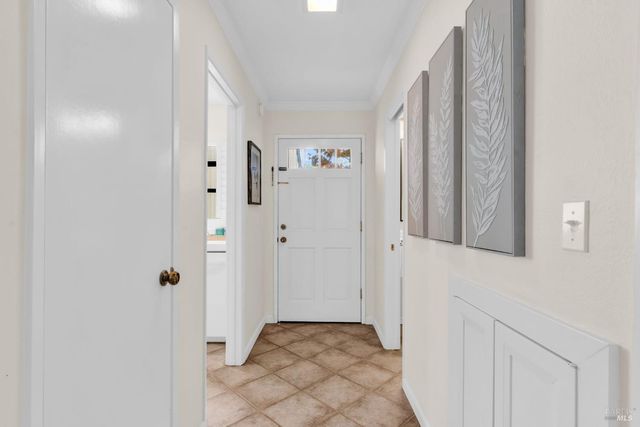 a bedroom with bed and window