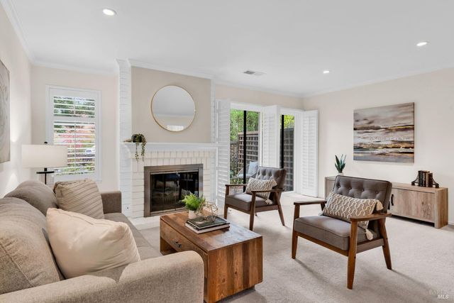 a living room with furniture and a couch