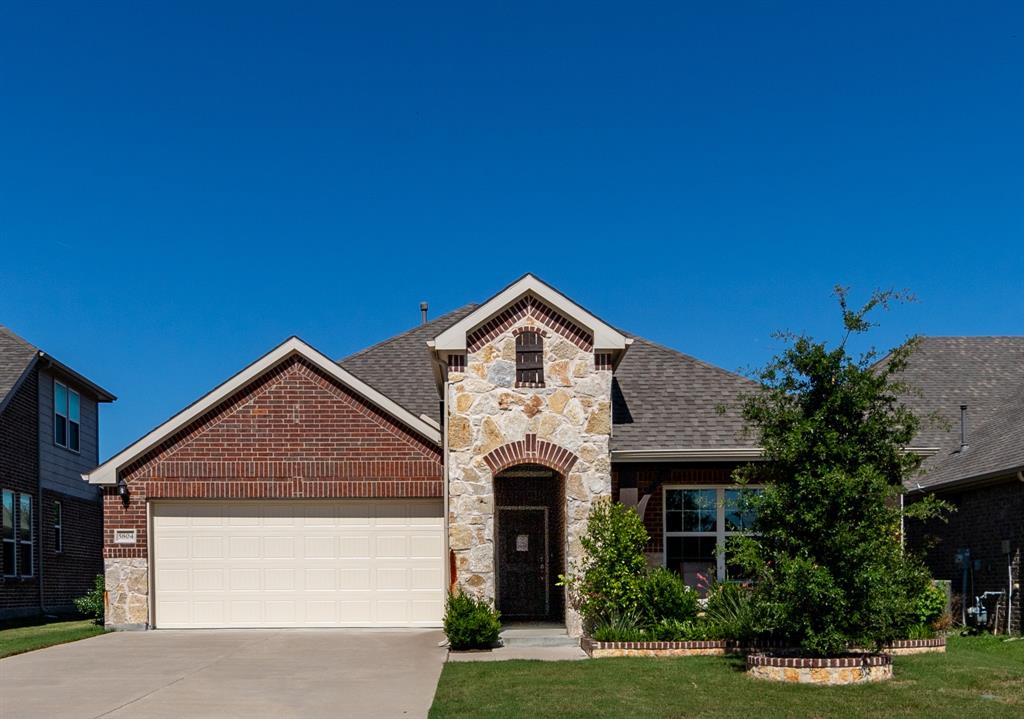5804 Coppermill Road Fort Worth, TX 76137 - Photo 1 of 1 a front view of a house with a yard