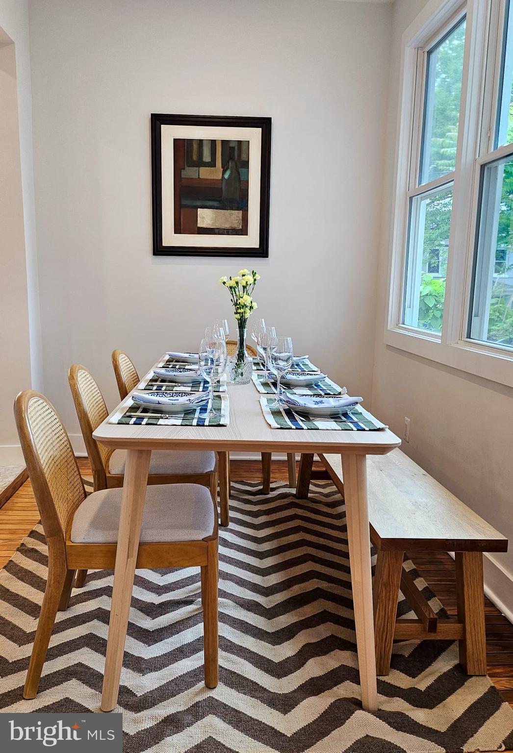 3206 Warder Street Northwest Washington, DC 20010 - Photo 15 of 30 a dining room with a table and chairs