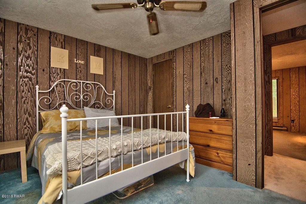 3278 Northgate Road Lake Ariel, PA 18436 - Photo 27 of 40 a bedroom with furniture and a window