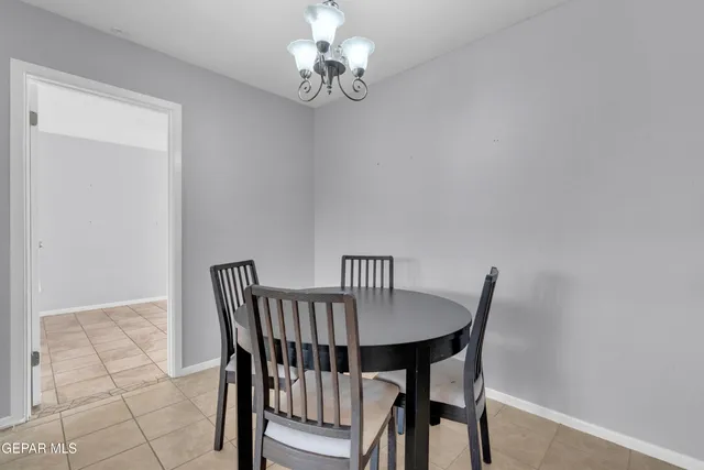 a kitchen with cabinets and window