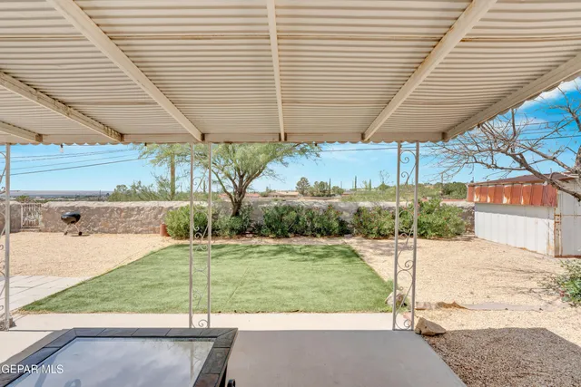 aerial view of a house with outdoor space