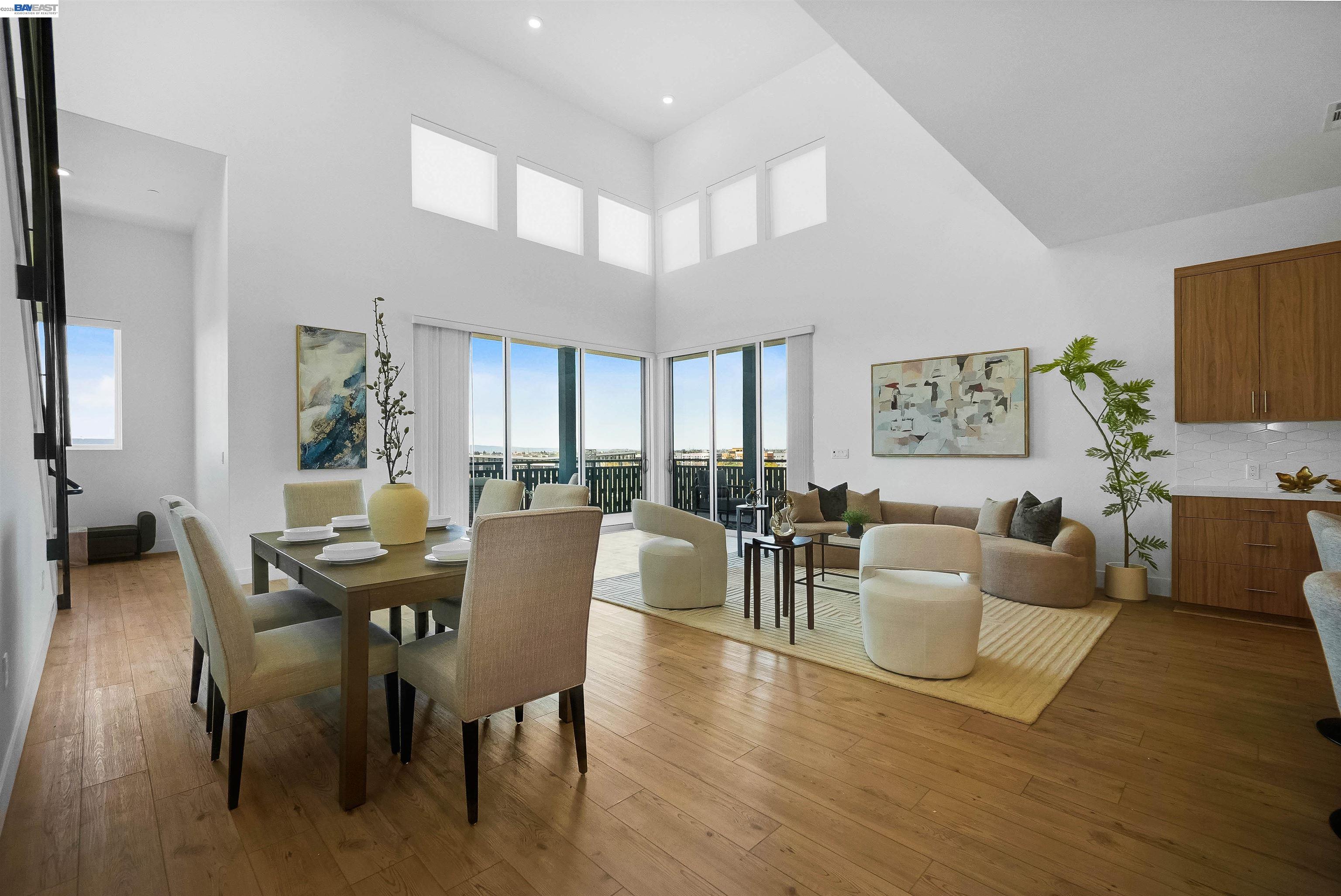 2250 Kilowatt Way, Unit 402 Fremont, CA 94539 - Photo 14 of 51 a view of a dining room with furniture and wooden floor