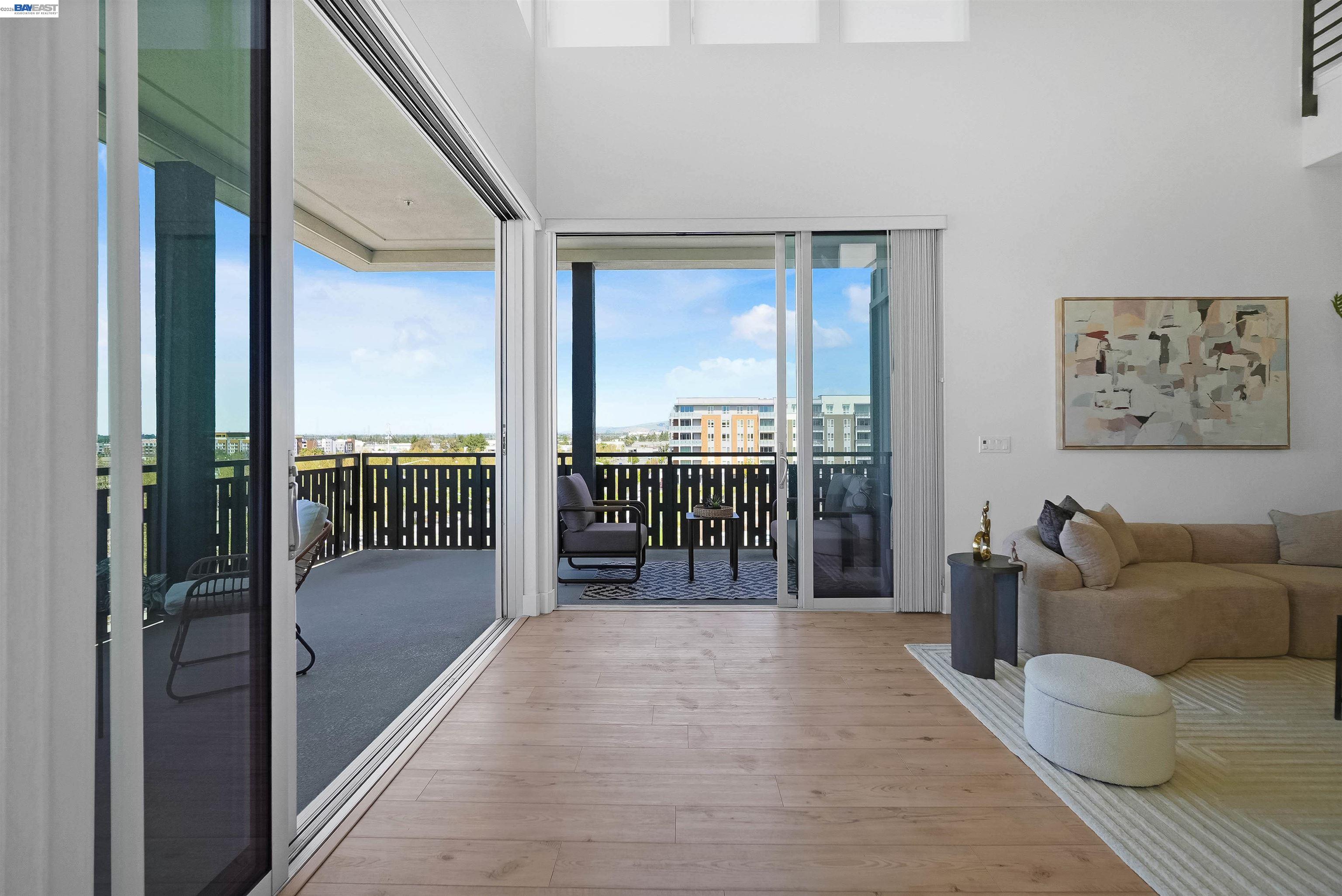 2250 Kilowatt Way, Unit 402 Fremont, CA 94539 - Photo 22 of 51 a view of a living room and a balcony