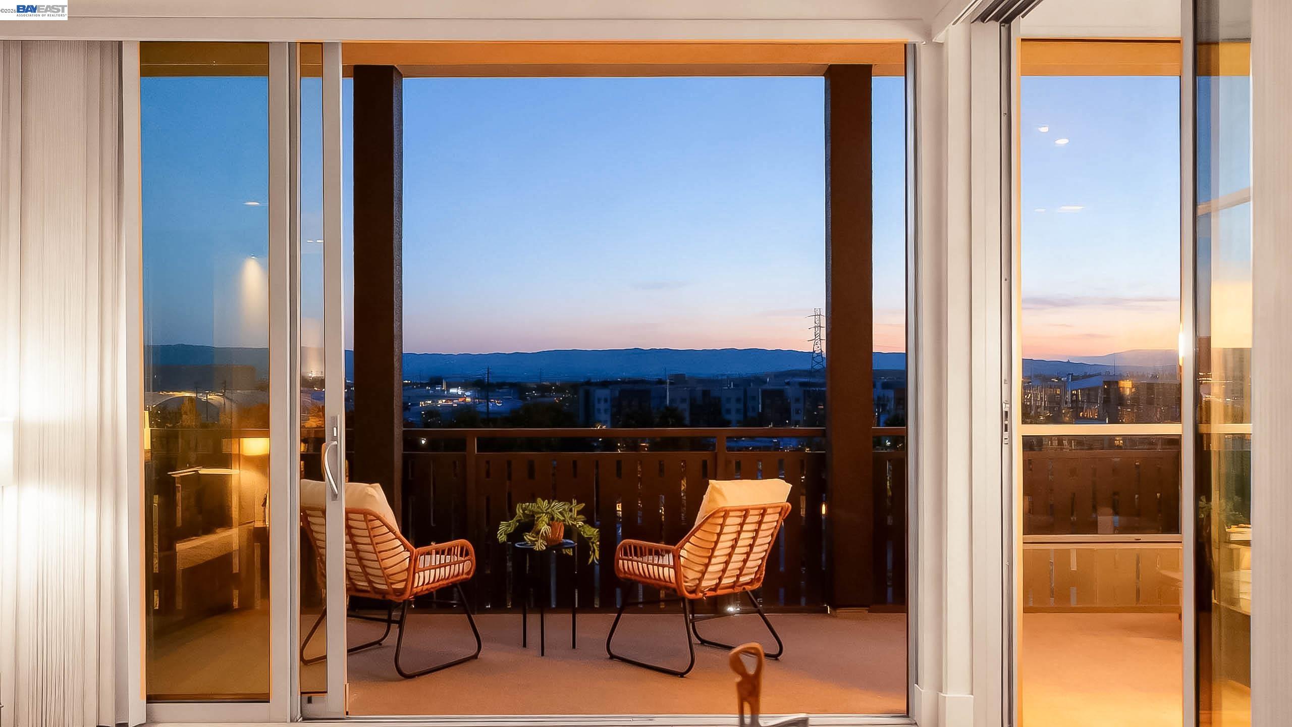2250 Kilowatt Way, Unit 402 Fremont, CA 94539 - Photo 29 of 51 a view of a balcony with chair and glass door