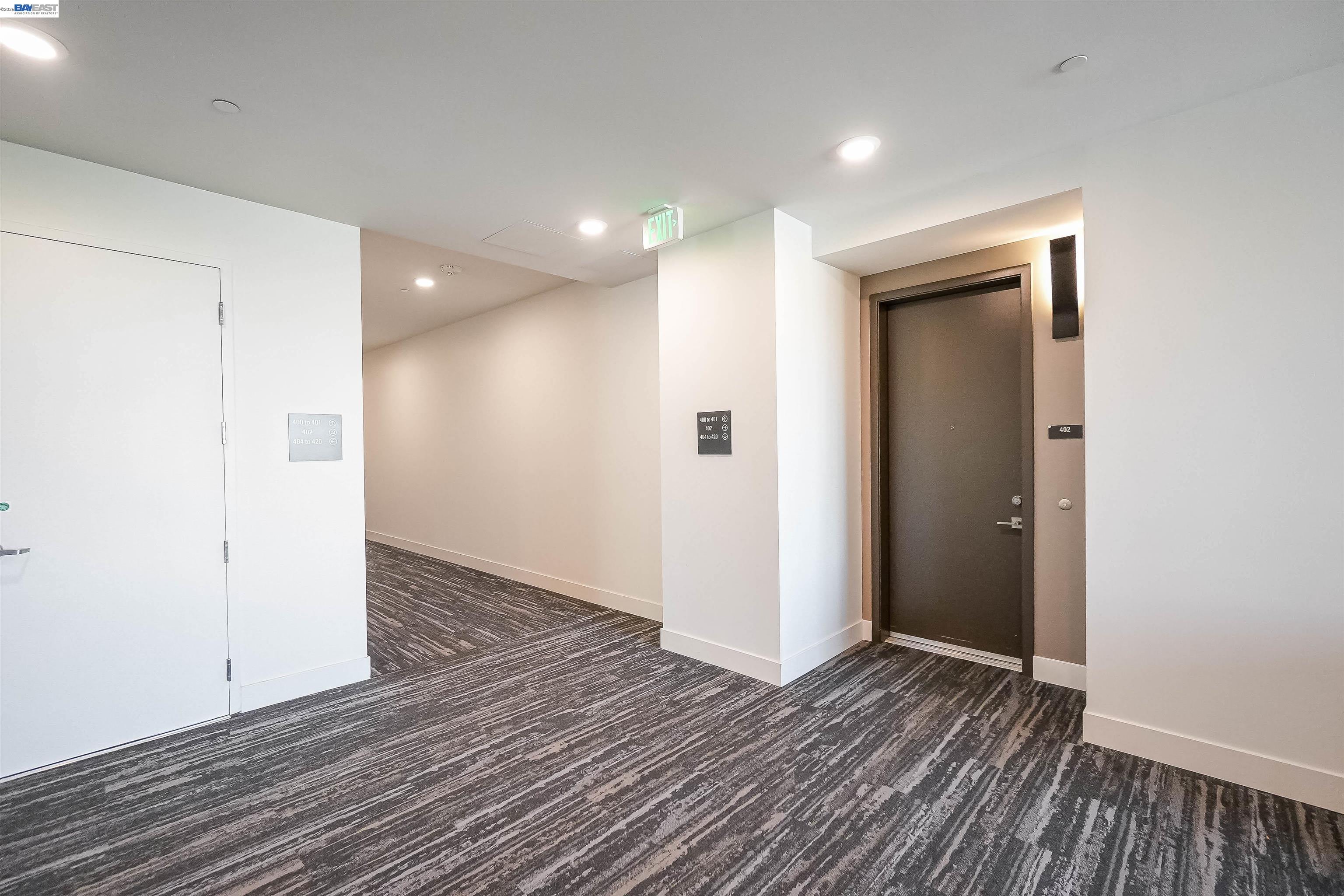 2250 Kilowatt Way, Unit 402 Fremont, CA 94539 - Photo 31 of 51 an empty room with wooden floor and entrance