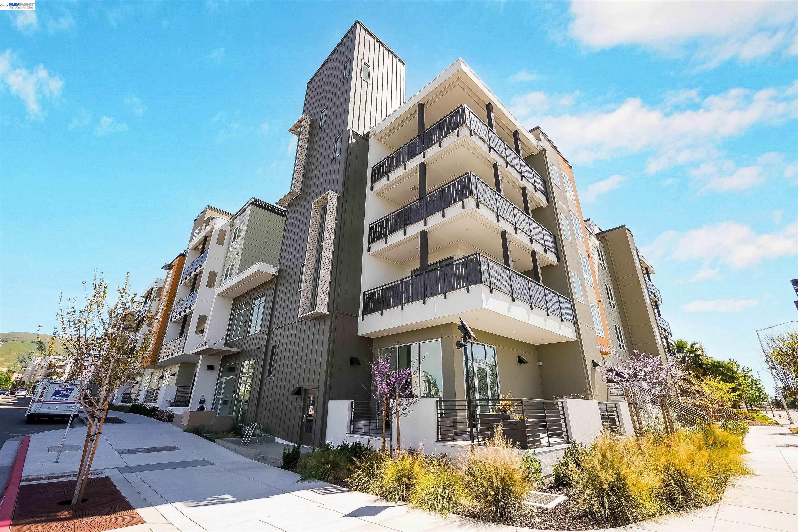 2250 Kilowatt Way, Unit 402 Fremont, CA 94539 - Photo 48 of 51 a view of a building with a yard