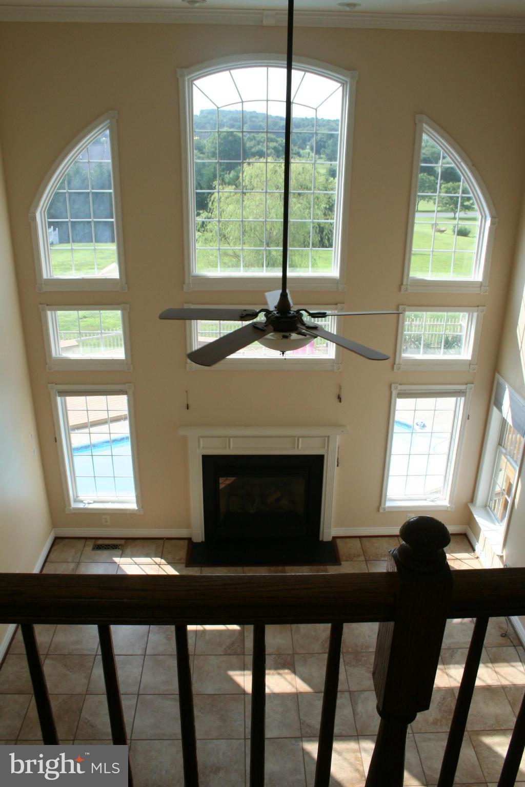 307 Ailsa Drive Rising Sun, MD 21911 - Photo 7 of 30 a living room with a table chair and a fireplace