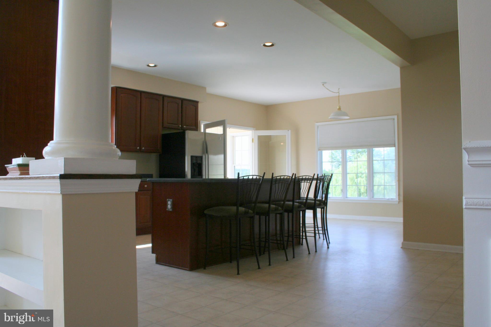 307 Ailsa Drive Rising Sun, MD 21911 - Photo 9 of 30 a view of a dining room with furniture window and wooden floor