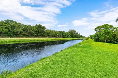 a view of a lake with a big yard