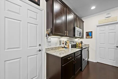 a bathroom with a sink a mirror and a toilet