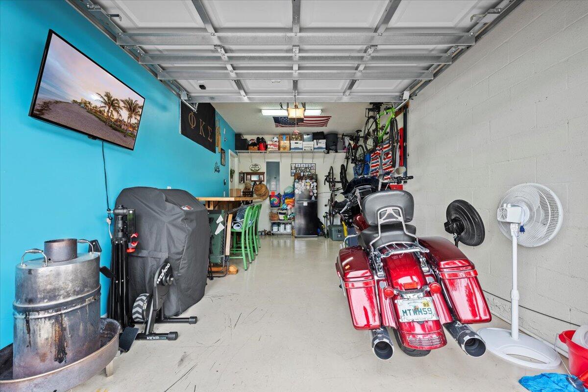 1108 South Community Drive Jupiter, FL 33458 - Photo 23 of 38 a storage room with furniture