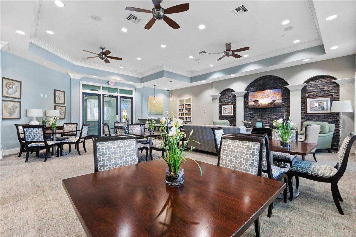 1108 South Community Drive Jupiter, FL 33458 - Photo 31 of 38 a living room with furniture and wooden floor