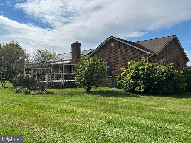 a house view with a garden space